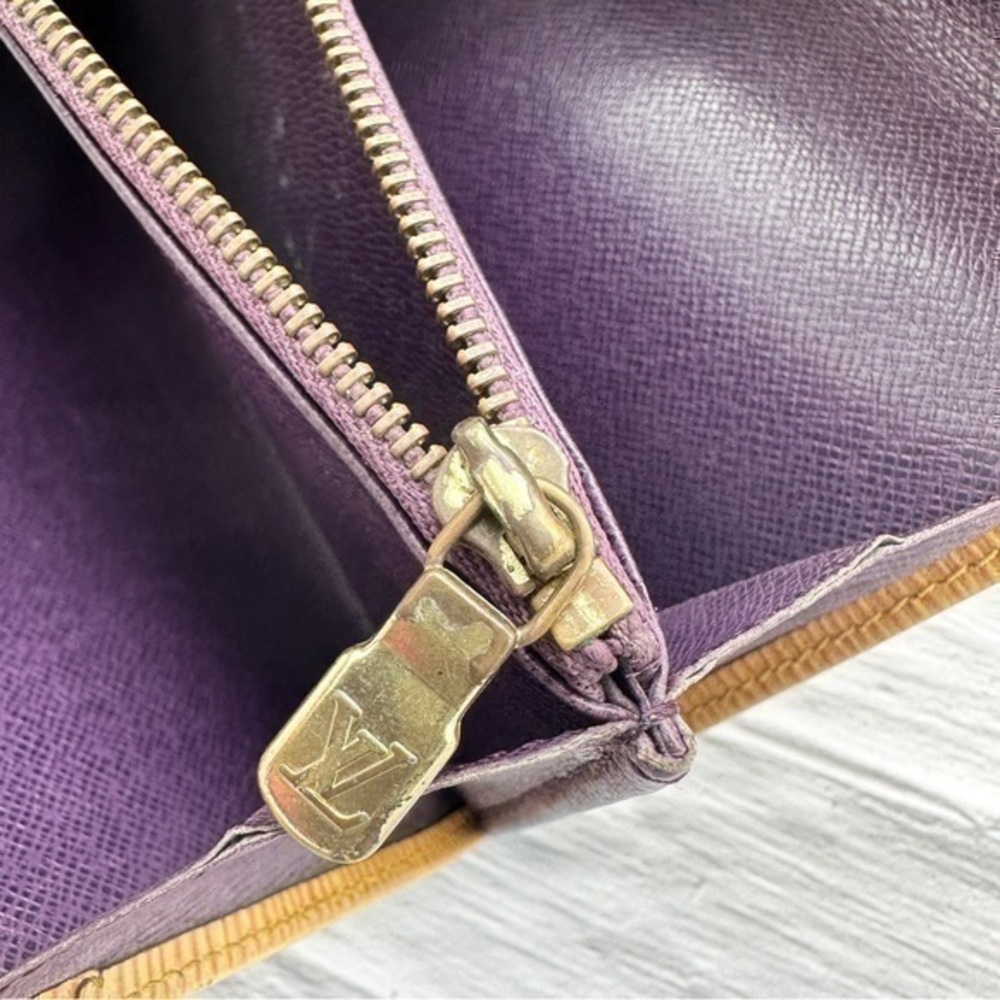 AUTHENTIC Louis Vuitton Epi Porte Tresor International wallet. Tassel yellow. - Picture 6 of 11